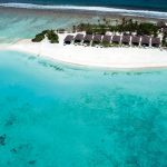 Atmosphere Kanifushi Maldives - Une vue aérienne des Sunset Pool Villas