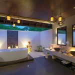 Atmosphere Kanifushi Maldives - La salle de bains d'une Sunset Junior Suite