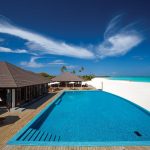 Atmosphere Kanifushi Maldives - Le restaurant-bar Sunset et sa piscine