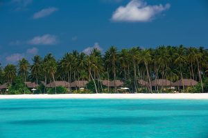 Atmosphere Kanifushi Maldives - Les Sunset Beach Villas, la plage et le lagon