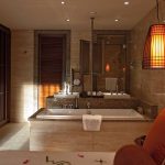 Constance Ephelia Seychelles - La chambre et la salle de bains d'une Senior Suite