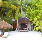Baros Maldives - La plage et une Deluxe Villa